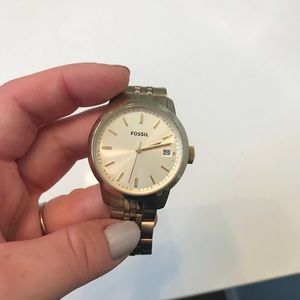 Gold women’s fossil watch